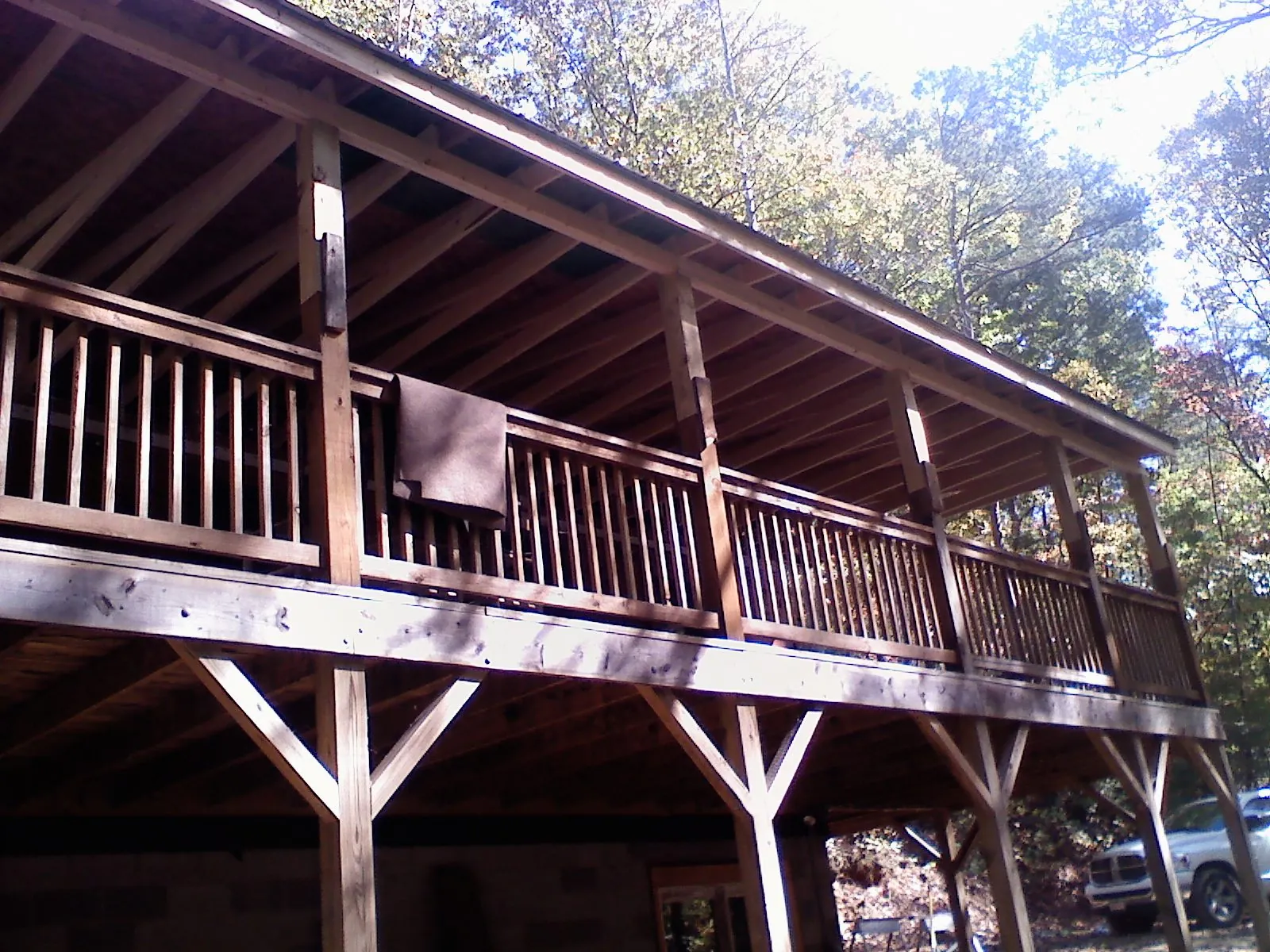 Timber framing under a new elevated porch and deck — Roof Leak Repair in Milford by Roofing Brothers